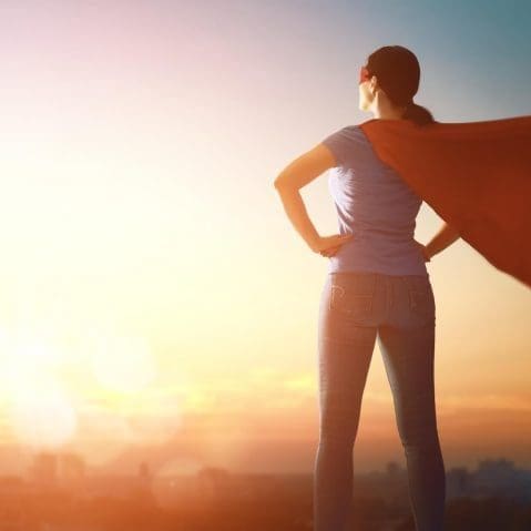 woman in superhero costume illustrating Immune Support in Scottsdale: How IV Therapy Strengthens Your Body's Natural Defenses